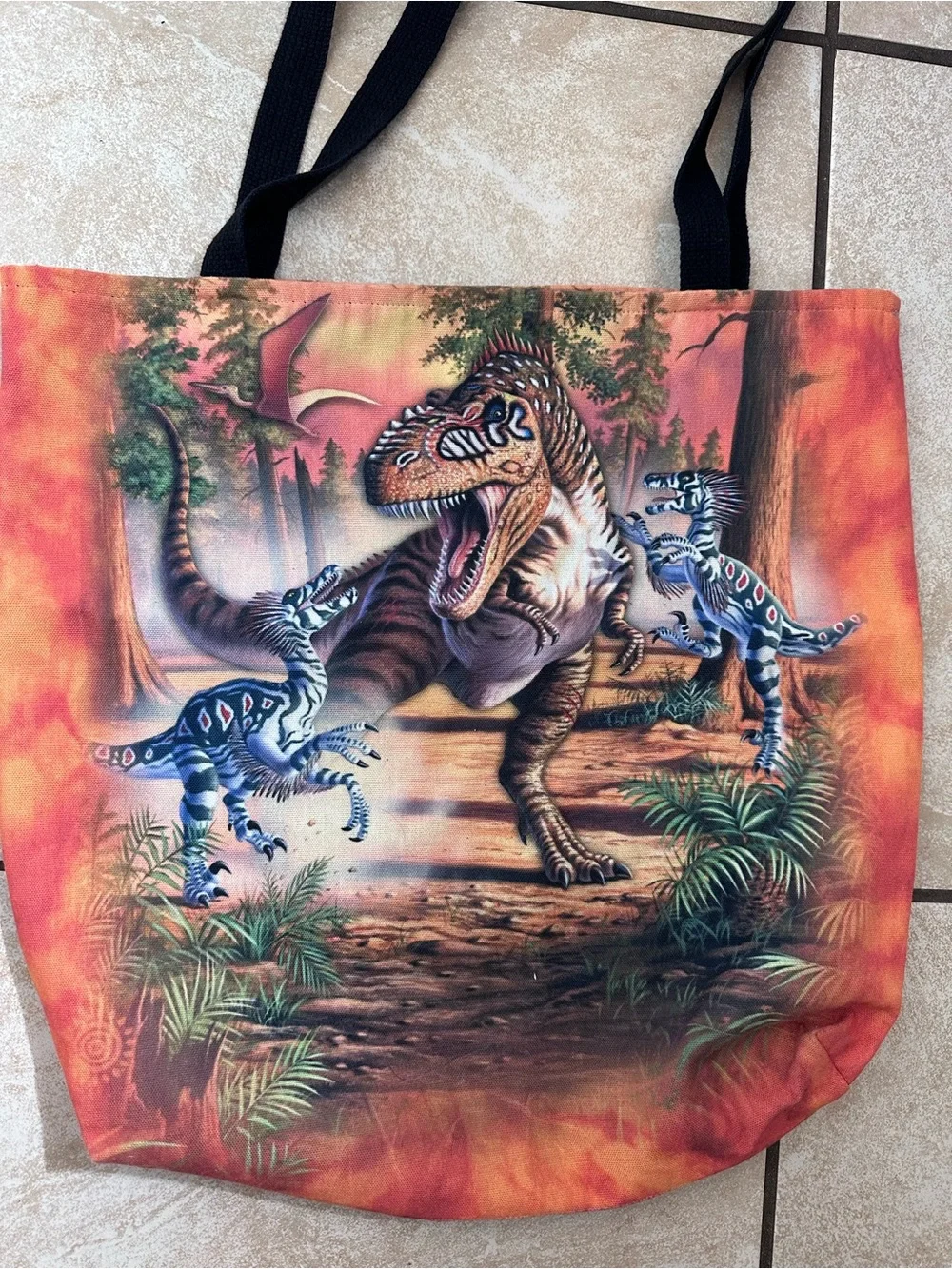 The Mountain Orange Dinosaur Messenger Bag with Black Straps